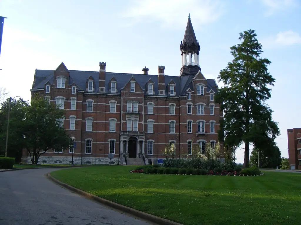 Fisk University's red-brick Jubilee Hall with its pointed central tower behind a curving drive and lawn