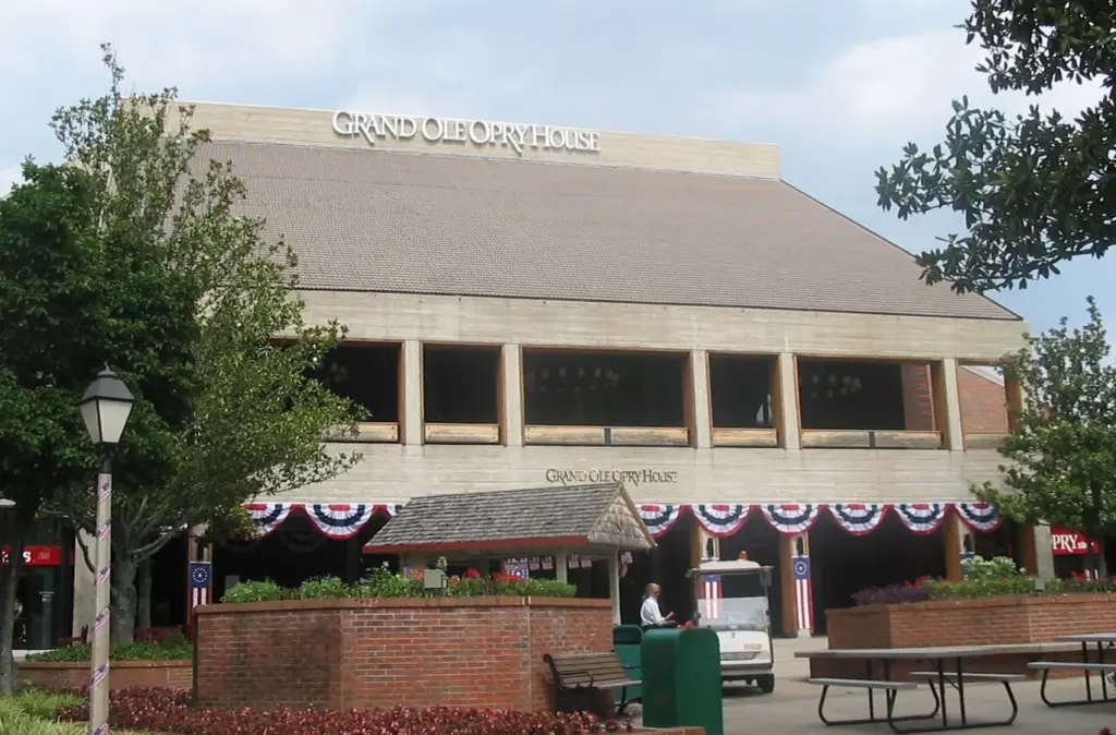 The Grand Ole Opry House, a low modern building with its name across the roofline and bunting over the entrance