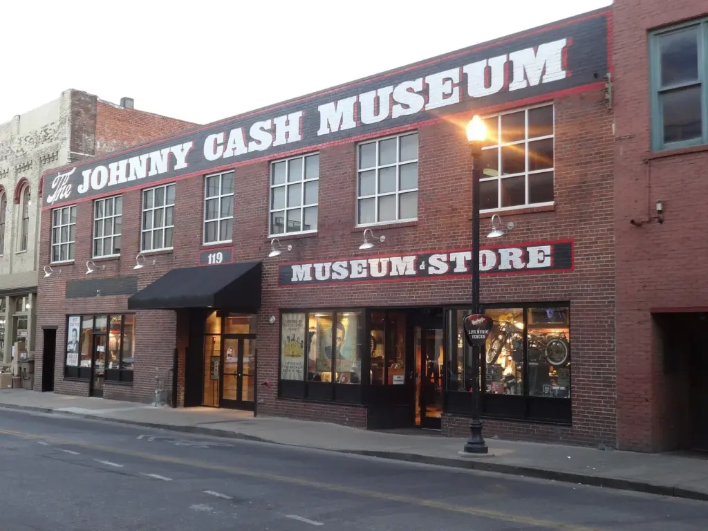The red-brick Johnny Cash Museum building with its painted sign on Third Avenue South