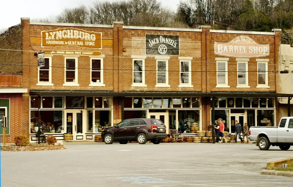 The brick storefronts of the Lynchburg Hardware and General Store and a barrel shop on the town square in Lynchburg, Tennessee