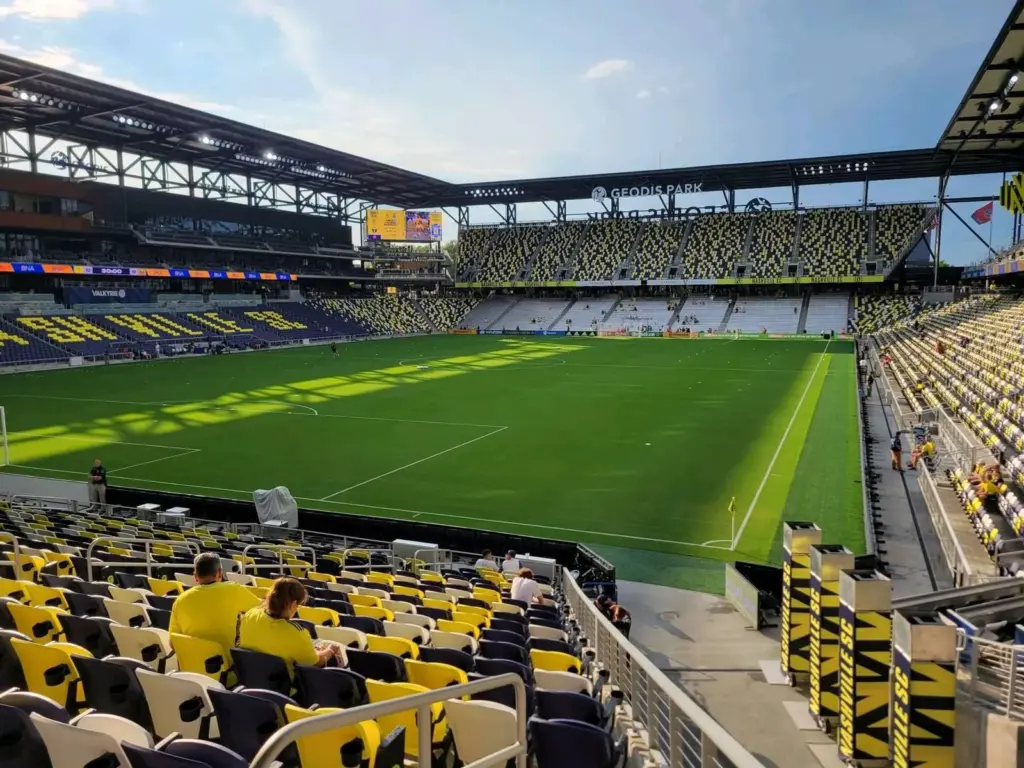 The pitch and gold-and-navy seating bowl inside Geodis Park during a Nashville SC match