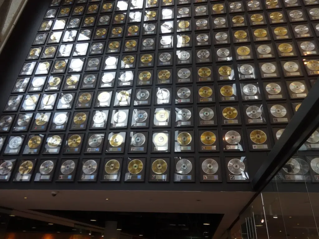 A towering wall of framed gold and platinum records inside the Country Music Hall of Fame